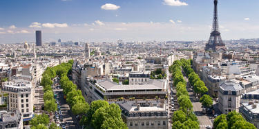 View on Paris from Arc de Triomphe. Eiffel tower on right, Avenue D´Iena and Tour Montparnasse on the left in background.